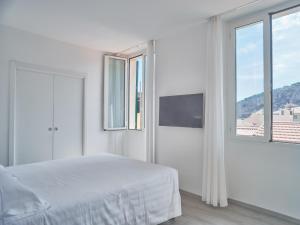 Телевизор и/или развлекательный центр в Hotel Medusa