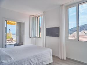 Телевизор и/или развлекательный центр в Hotel Medusa