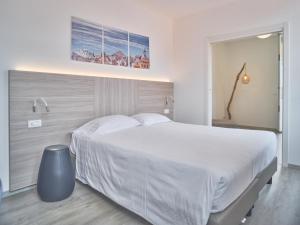 Кровать или кровати в номере Hotel Medusa