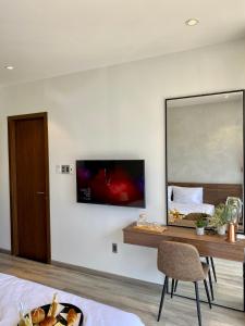 TV a/nebo společenská místnost v ubytování Charisma Hotel Da Lat