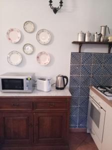 Dapur atau dapur kecil di S'orrosa casa vacanze bifamiliare in montagna panorama stupendo Sardegna