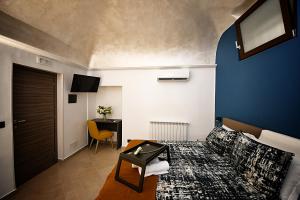 Posteľ alebo postele v izbe v ubytovaní B&B AURORA