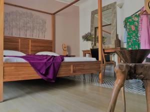 Postel nebo postele na pokoji v ubytování Vranas Ambiance Hotel