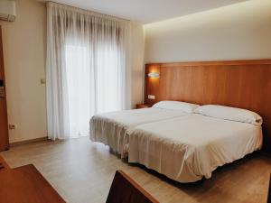 Postel nebo postele na pokoji v ubytování Hotel Campomar 3*** Superior