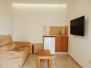 TV a/nebo společenská místnost v ubytování Hotel Campomar 3*** Superior