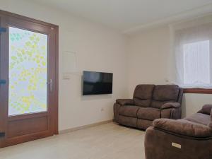 TV a/nebo společenská místnost v ubytování Hotel Campomar 3*** Superior
