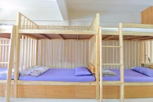 Postel nebo postele na pokoji v ubytování Saen Sabai Hostel