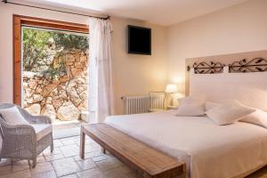 Ένα ή περισσότερα κρεβάτια σε δωμάτιο στο Albero Capovolto