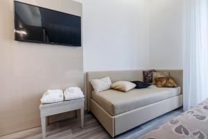 TV a/nebo společenská místnost v ubytování Hotel Stella D'Oro