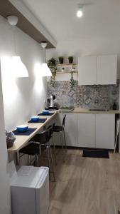 Kuchyň nebo kuchyňský kout v ubytování Mattia's house 2