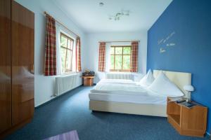 Кровать или кровати в номере Hotel Liszt