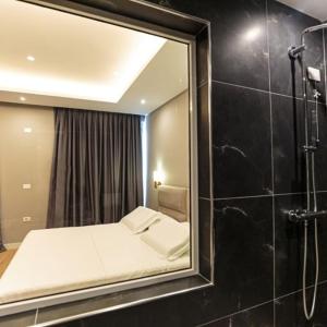 Koupelna v ubytování Real Hotel