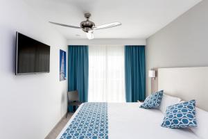 Postel nebo postele na pokoji v ubytování Hotel Riu Papayas - All Inclusive