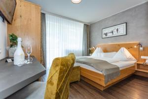 Katil atau katil-katil dalam bilik di Hotel Almrausch