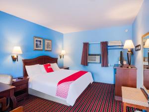 OYO Hotel Salem-Roanoke I-81 tesisinde bir odada yatak veya yataklar
