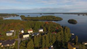 an aerial view of a small island in a lake at huoneisto 2 in Savonlinna