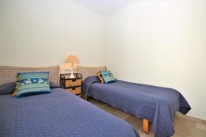 Posteľ alebo postele v izbe v ubytovaní Apartment BERNAL
