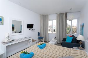 TV a/nebo společenská místnost v ubytování Hotel Opera