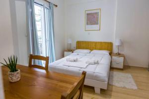 Ένα ή περισσότερα κρεβάτια σε δωμάτιο στο Cloud 5 Apartment