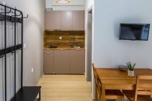 Η κουζίνα ή μικρή κουζίνα στο Cloud 5 Apartment