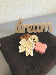 a chocolate cake with the word smile and cookies at Studio apartman Firdaus-Bihać, Dobrenica bb in Bihać +26 photos