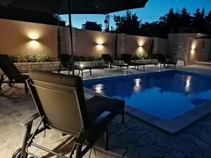 Bazén v ubytování Villa Mir Pridraga nebo v jeho okolí