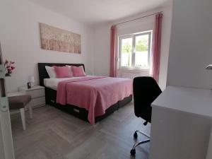 Postel nebo postele na pokoji v ubytování Villa Mir Pridraga
