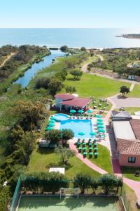 an aerial view of a resort with a pool at Li Suari Club Village in San Teodoro