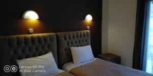 Letto o letti in una camera di Studios Spiros Parga