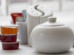 a white jug and some containers on a counter at The Marsden Hotel in Blackpool