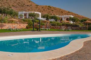 The swimming pool at or close to Finca Maltes San José