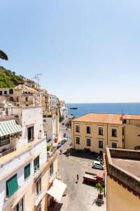 an aerial view of a city with the ocean at LUIMAR Holiday House in Amalfi