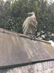 a statue of an elephant sitting on top of a building at Castle Rooms in Cardiff