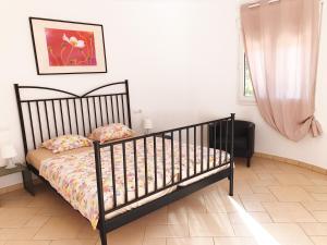 A bed or beds in a room at Villa Redonda I Még 9 kép