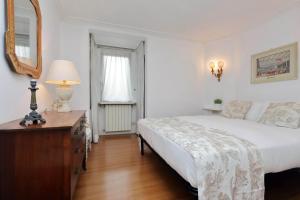 Posteľ alebo postele v izbe v ubytovaní RomeAsYouLike - Arancio Apartments N°9