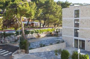an aerial view of a building with a tree at Villa Sveti Križ in Trogir
