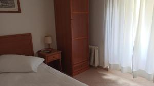 Postel nebo postele na pokoji v ubytování Albergo Miravalle