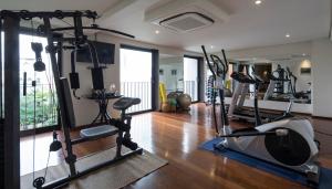 a gym with several tread machines in a room at Hotel Villa Amazônia in Manaus