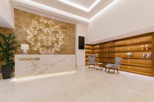 Posezení v ubytování Acandia Hotel