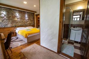 Postel nebo postele na pokoji v ubytování Apartments Tango