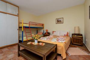 Postel nebo postele na pokoji v ubytování Vila Milena