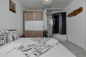 Postel nebo postele na pokoji v ubytování Vila Milena