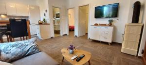 TV a/nebo společenská místnost v ubytování Kandarola Resort