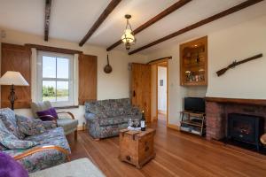 Area soggiorno di Kilmore Cottages Self - Catering