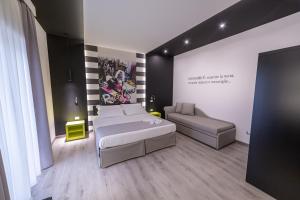 A bed or beds in a room at HOLYGOLD Suite ****
