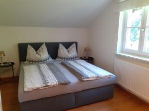 Łóżko lub łóżka w pokoju w obiekcie Haus Gertrude Hörack