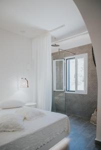 Posteľ alebo postele v izbe v ubytovaní Manthos Place 2