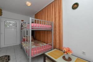 Postel nebo postele na pokoji v ubytování Vila Milena