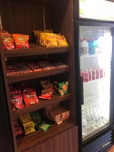 a refrigerator filled with lots of food and drinks at Baymont by Wyndham Chambersburg in Chambersburg