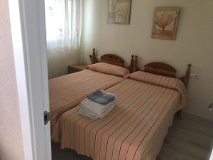 Posteľ alebo postele v izbe v ubytovaní SERVICE APART LAZARO - Aguamarina 1 dormitorio